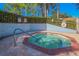 Community hot tub with brick border at 2582 Bentley Dr, Palm Harbor, FL 34684
