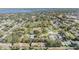 Community overview featuring lakefront property and green spaces at 2582 Bentley Dr, Palm Harbor, FL 34684