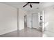 Bright bedroom with ceiling fan, closet and bathroom entrances at 3612 W Leila Ave, Tampa, FL 33611