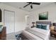 A comfy bedroom features a bed with throw pillows and direct access to the ensuite bathroom at 3612 W Leila Ave, Tampa, FL 33611
