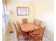 Bright dining area with wood table and chairs, perfect for Gathering meals at 5407 29Th S Ave, Gulfport, FL 33707