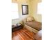 Bedroom with daybed and hardwood floors at 5407 29Th S Ave, Gulfport, FL 33707