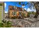 Inviting yellow house with white picket fence and landscaping at 5407 29Th S Ave, Gulfport, FL 33707
