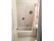Bathroom with tub, shower, and beach-themed decor at 5407 29Th S Ave, Gulfport, FL 33707
