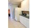 Efficient kitchen with white cabinets and appliances at 5407 29Th S Ave, Gulfport, FL 33707
