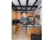 Modern kitchen features stainless steel appliances and light wood cabinets at 5407 29Th S Ave, Gulfport, FL 33707