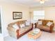 Living room with sofas and a coffee table at 5407 29Th S Ave, Gulfport, FL 33707
