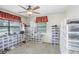 Well-lit bedroom with ample shoe storage at 704 Medina Way, Sun City Center, FL 33573