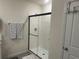 Bathroom with walk-in shower and modern fixtures at 16910 Trite Bend St, Wimauma, FL 33598