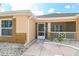 Front entrance with screened porch and decorative walkway at 2331 W Del Webb Blvd, Sun City Center, FL 33573