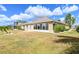 House exterior with large backyard and sunroom at 2331 W Del Webb Blvd, Sun City Center, FL 33573