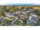 Aerial view of home, pool, and neighborhood at 2825 60Th N St, St Petersburg, FL 33710