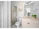 Small bathroom with shower, toilet, and vanity at 3073 Woodsong Ln, Clearwater, FL 33761