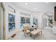 Breakfast nook with glass table and view of pool at 3073 Woodsong Ln, Clearwater, FL 33761