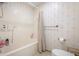 Updated bathroom with shower/tub combo and neutral decor at 3073 Woodsong Ln, Clearwater, FL 33761