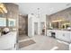 Spacious bathroom with double vanity, walk-in shower, and chandelier at 3073 Woodsong Ln, Clearwater, FL 33761