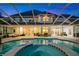 Inviting pool and spa area with covered patio, perfect for outdoor entertaining at 3073 Woodsong Ln, Clearwater, FL 33761