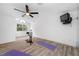 Home exercise room with yoga mats and workout equipment at 3073 Woodsong Ln, Clearwater, FL 33761