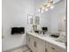 Elegant bathroom with quartz countertop and gold accents at 3073 Woodsong Ln, Clearwater, FL 33761