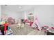 Spacious playroom with plenty of room for ' toys and activities at 3073 Woodsong Ln, Clearwater, FL 33761