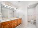 Bathroom with double vanity and updated cabinets at 3073 Woodsong Ln, Clearwater, FL 33761