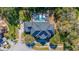 Aerial view showcasing a home with pool and large backyard at 3073 Woodsong Ln, Clearwater, FL 33761