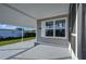 Mobile home exterior view, showing covered patio and entrance at 39053 Flora Ave, Zephyrhills, FL 33542