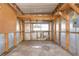 Unfinished workshop with metal siding and loft storage at 39053 Flora Ave, Zephyrhills, FL 33542