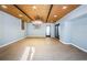 Open unfinished basement featuring light blue walls, modern lighting, and ample space for recreation at 496 Palm Ave, Palm Harbor, FL 34683