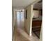 View of living room and kitchen with tiled floors at 6345 Newtown Cir # 45A3, Tampa, FL 33615