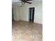 Spacious living room featuring tile floors and ceiling fan at 6345 Newtown Cir # 45A3, Tampa, FL 33615