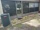 AC unit located outside a screened patio at 6345 Newtown Cir # 45A3, Tampa, FL 33615