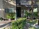 Condo exterior with walkway, landscaping, and private entrance at 6345 Newtown Cir # 45A3, Tampa, FL 33615
