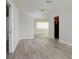 Open-concept living and dining area featuring new floors, fresh paint, and abundant natural light at 6701 13Th N Ave, St Petersburg, FL 33710