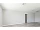 Bright, open living room with neutral walls, and wood-look laminate flooring offers a modern feel at 6701 13Th N Ave, St Petersburg, FL 33710