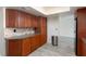 Modern kitchen with wood cabinets and granite countertops at 6701 13Th N Ave, St Petersburg, FL 33710