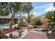 Unique water feature with pond and fountain, adding to the backyard oasis at 1003 Mandalay Dr, Brandon, FL 33511