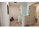Upstairs hallway with light paint and carpeted floors at 11834 Brighton Knoll Loop, Riverview, FL 33579