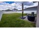 Backyard patio with seating area and umbrella at 11834 Brighton Knoll Loop, Riverview, FL 33579