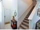 Staircase with carpeted steps and neutral wall color at 11834 Brighton Knoll Loop, Riverview, FL 33579