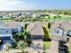 Aerial view of a home showcasing its well-maintained landscaping at 16912 Yellow Pine St, Wimauma, FL 33598