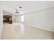 Open-concept floor plan features a view to the modern kitchen at 16912 Yellow Pine St, Wimauma, FL 33598