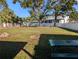 Spacious backyard with a picnic table and fire pit at 2725 W Tyson Ave, Tampa, FL 33611