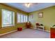 Bedroom with window seat and neutral color palette at 390 Cypress Creek Cir, Oldsmar, FL 34677