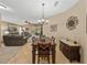 Dining area view of living room and kitchen at 5726 Autumn Shire Dr, Zephyrhills, FL 33541