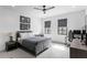 Comfortable bedroom with natural light, ceiling fan, and a dedicated desk area at 5811 Mariner St, Tampa, FL 33609