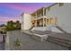 Stunning home featuring a pool with fire feature and covered patios, perfect for entertaining at 5811 Mariner St, Tampa, FL 33609