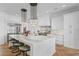 Spacious kitchen with marble countertops, a large island, stainless steel appliances, and ample storage at 5811 Mariner St, Tampa, FL 33609