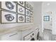 Bright laundry room with marble countertops, white cabinets, and a modern washer and dryer at 5811 Mariner St, Tampa, FL 33609