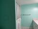 Bathroom with walk-in shower and grab bars at 820 Virginia St # 207, Dunedin, FL 34698